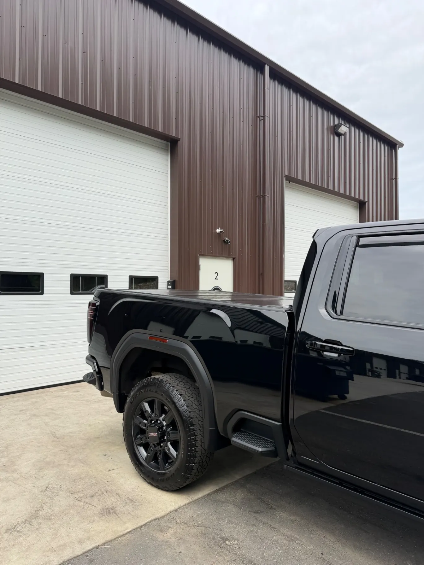 GMC Sierra 2500 AT4 black rear bed detailing Shrewsbury MA