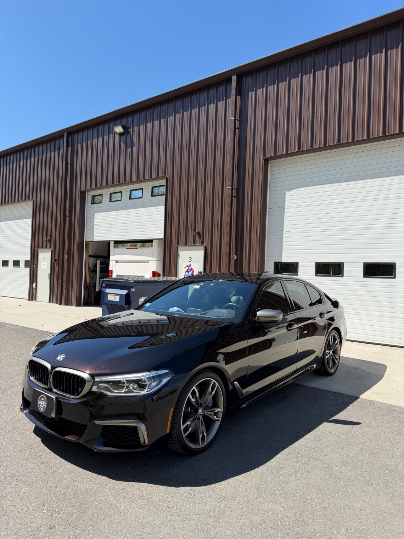 BMW M550i black ceramic coating outside Secret Touch Auto Spa Shrewsbury MA