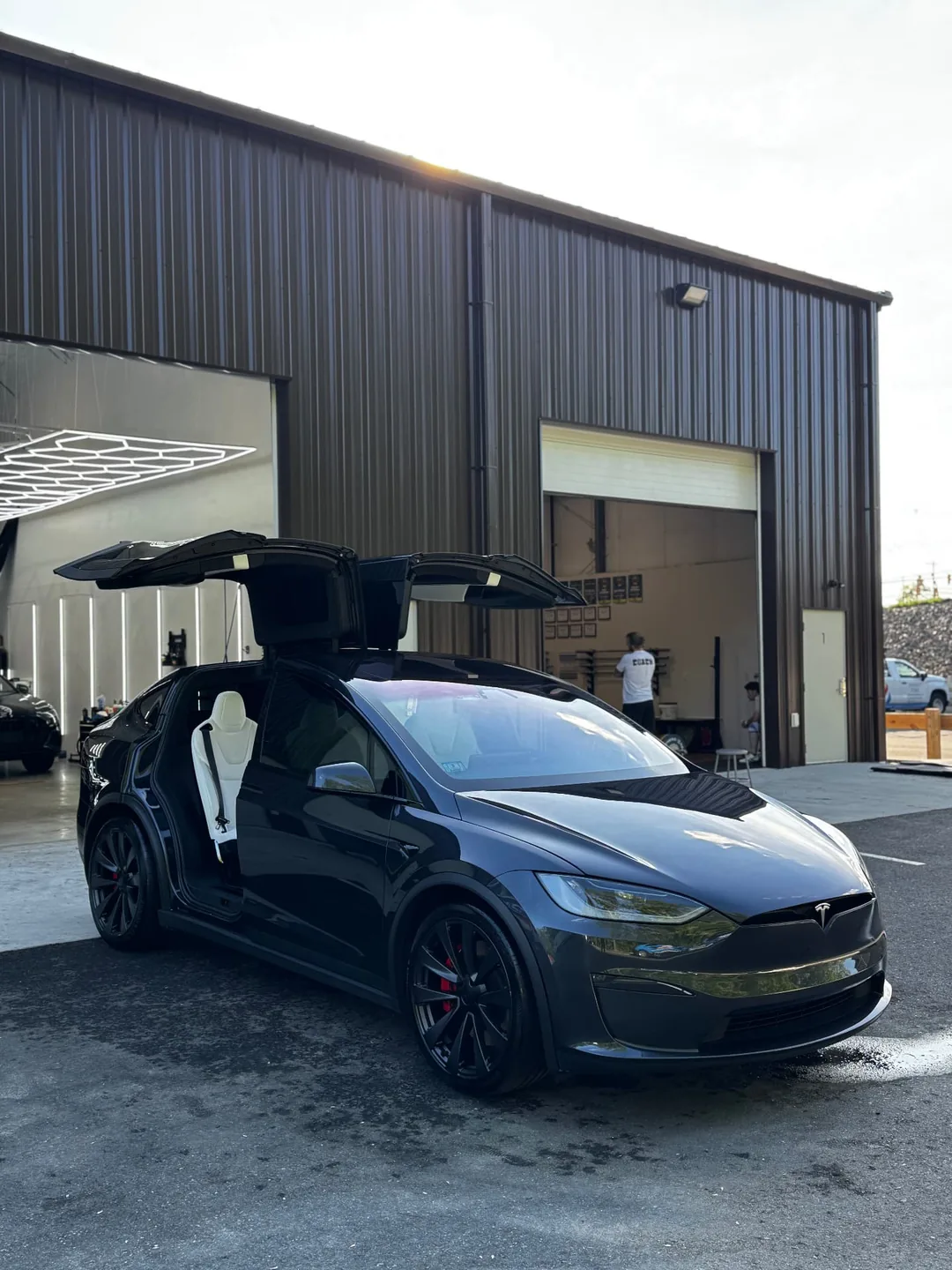 Black Tesla Model X with paint protection film at Secret Touch Auto Spa Shrewsbury MA