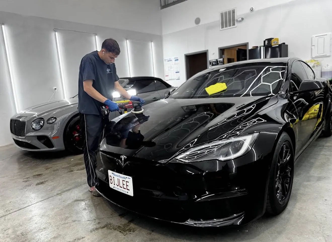 Black Tesla paint protection and correction work at Secret Touch Auto Spa Shrewsbury MA