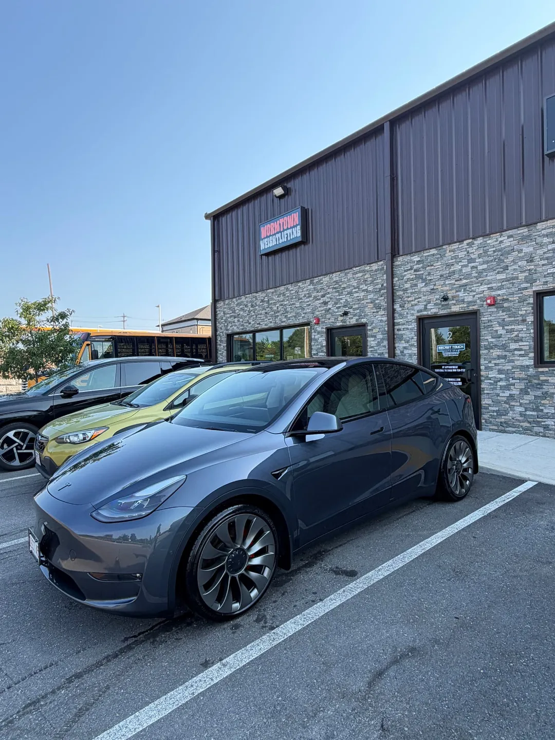 Tesla Model Y at the Secret Touch Auto Spa shop in Shrewsbury MA