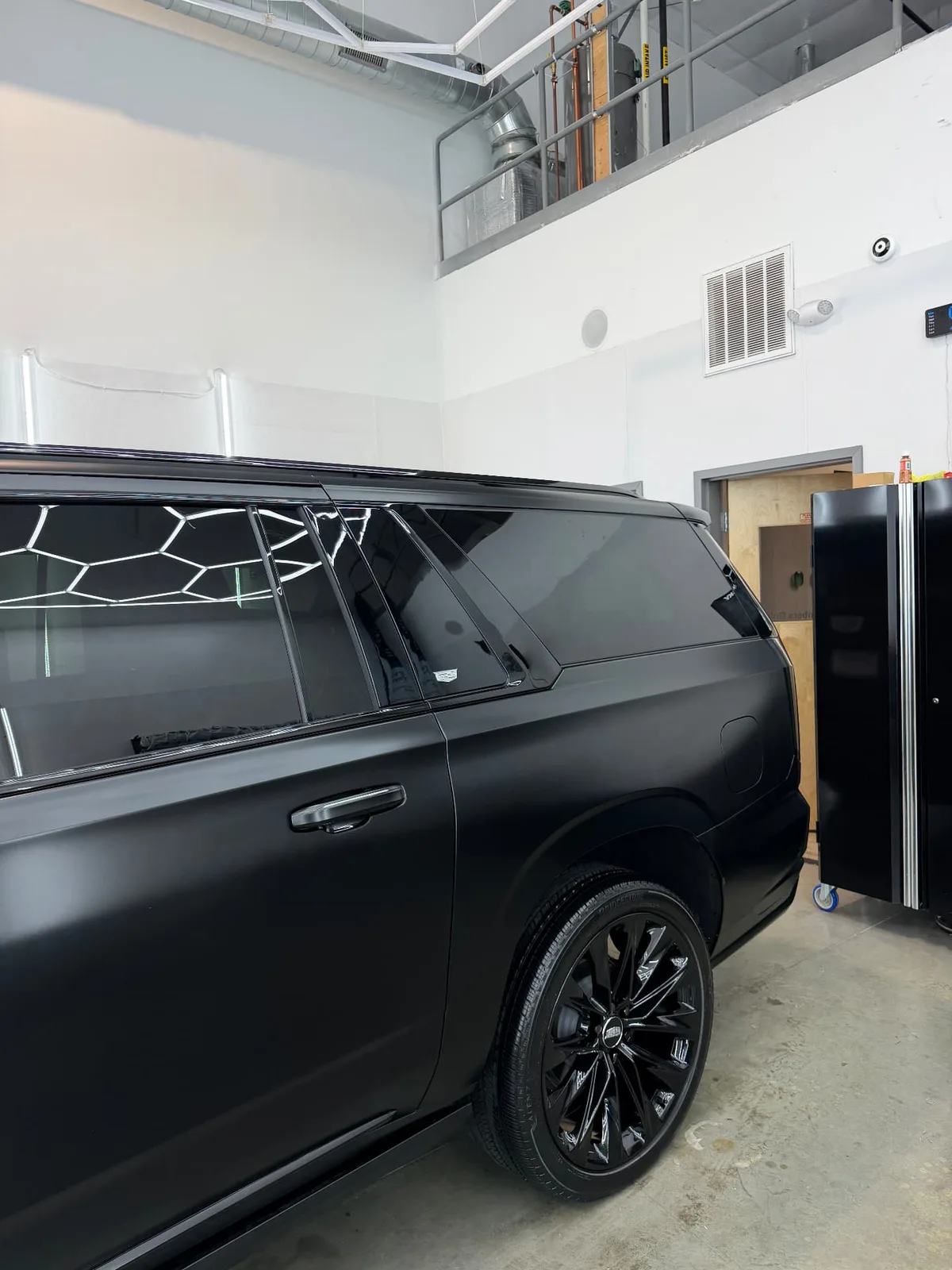 Close-up of the Cadillac Escalade-V rear wheel PPF finish in Shrewsbury MA