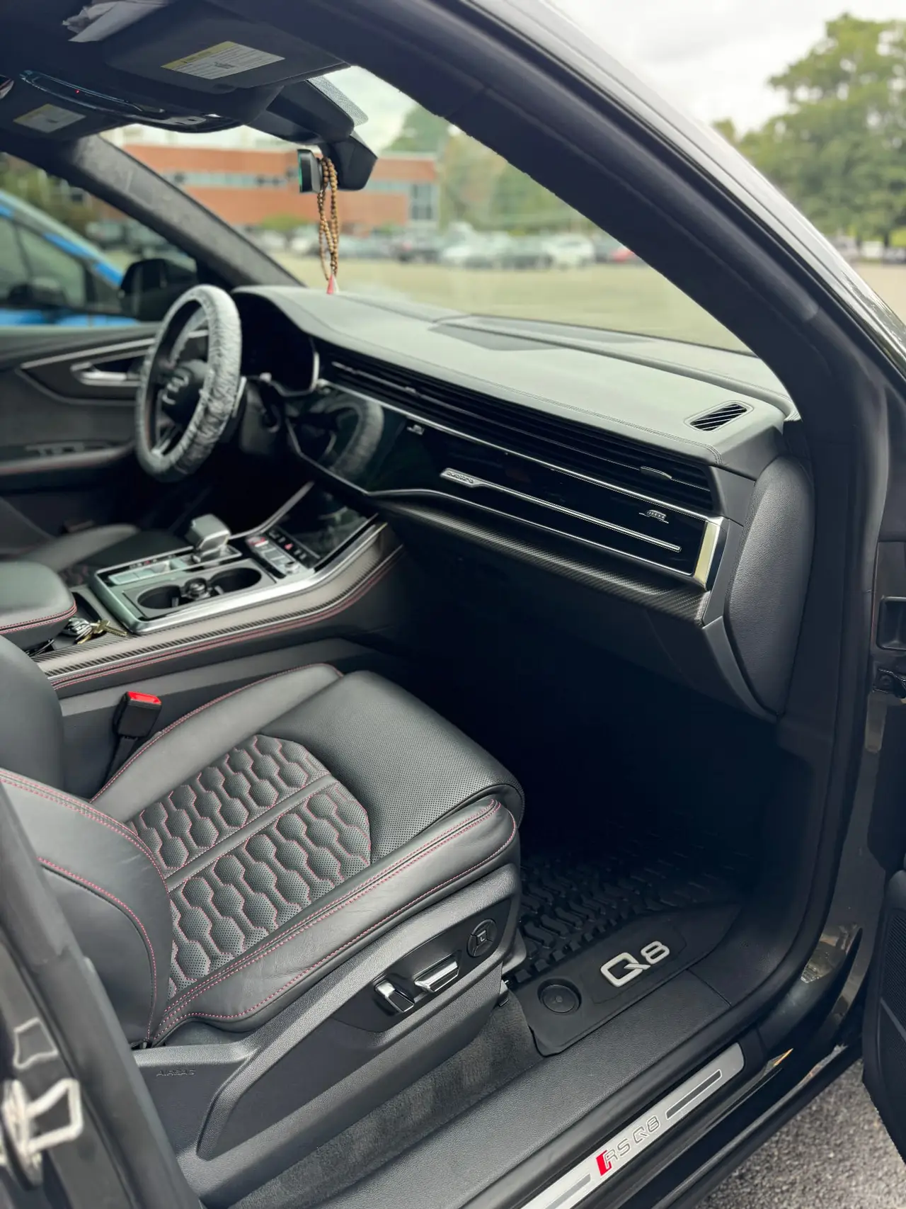 Audi RS Q8 passenger seat interior detail with honeycomb leather