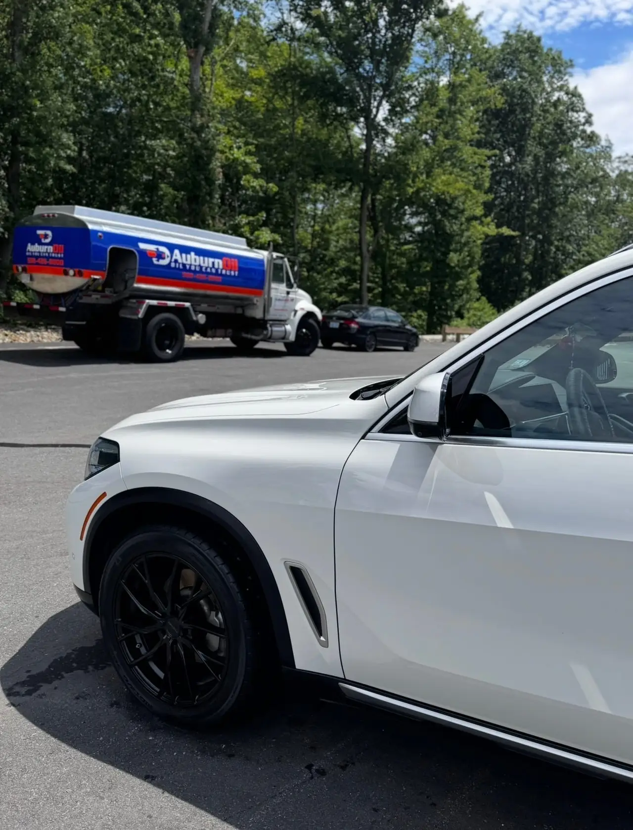 After - BMW X5 white exterior side before and after detailing Shrewsbury MA