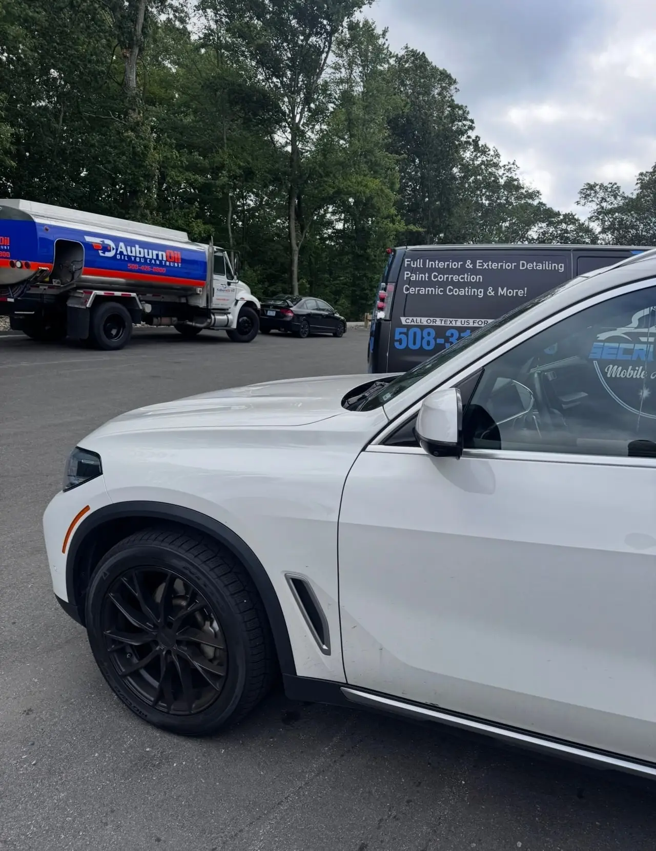 Before - BMW X5 white exterior side before and after detailing Shrewsbury MA
