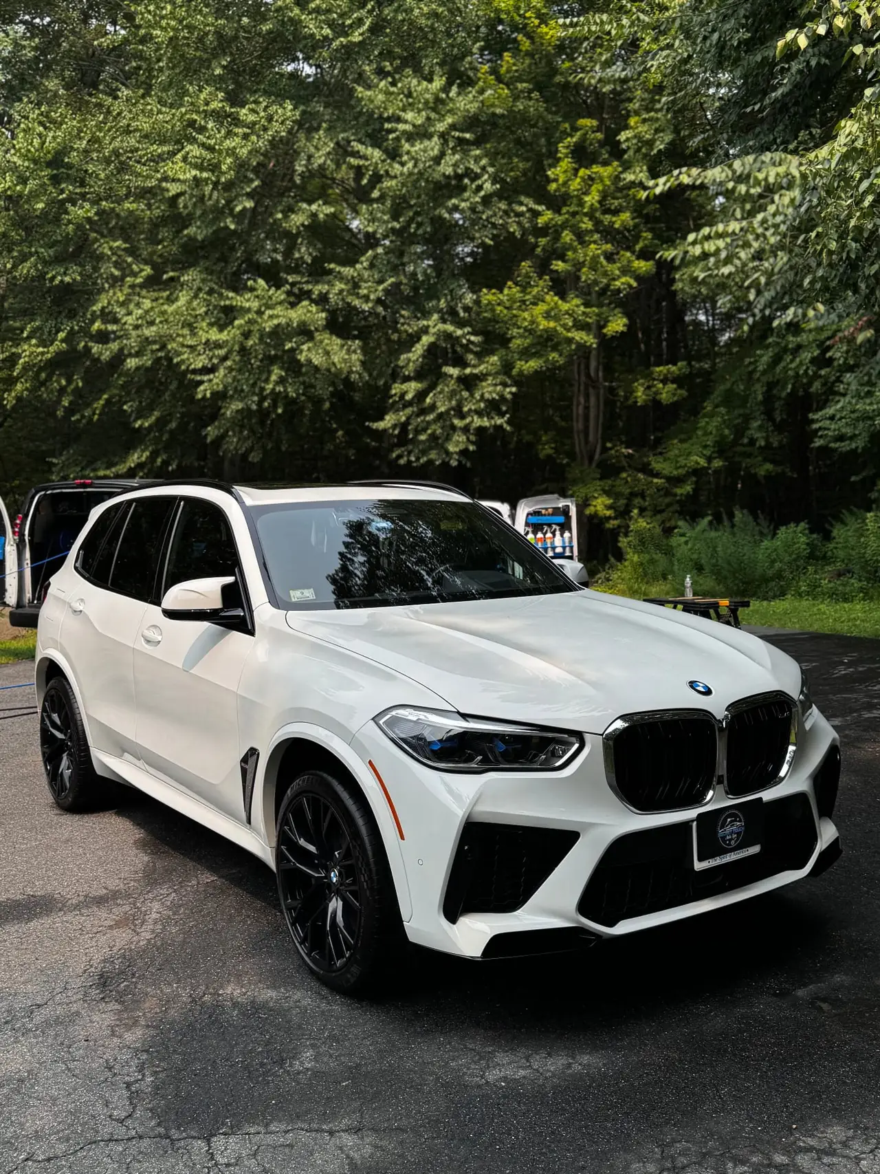 BMW X5M white with gloss black powder coated wheels Shrewsbury MA