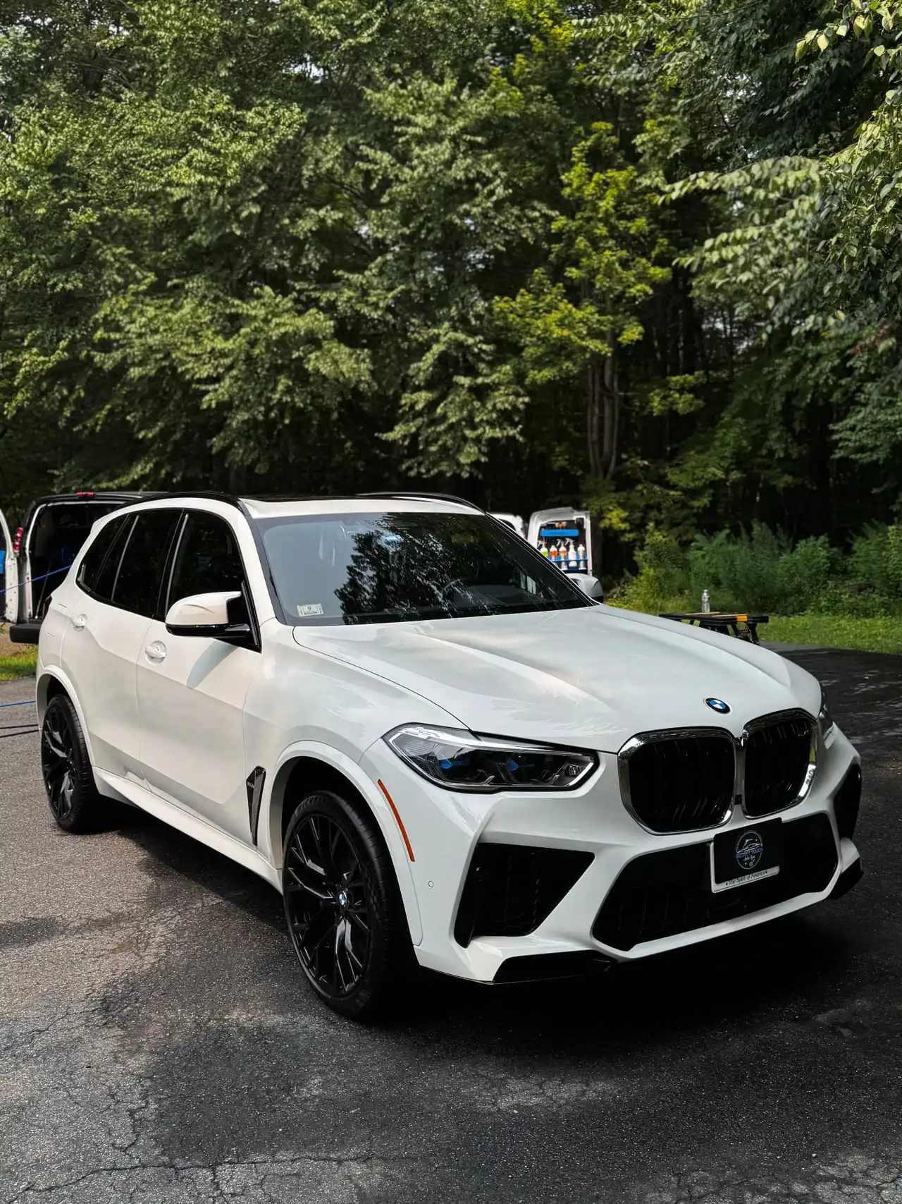 BMW X5M white with gloss black powder coated wheels Shrewsbury MA