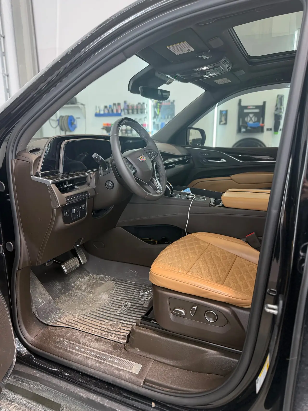 Before - Cadillac Escalade interior driver seat before and after detailing Shrewsbury MA