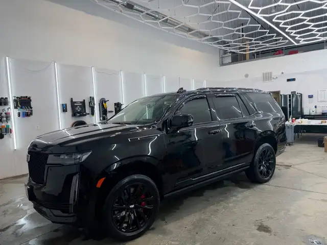 After - Cadillac Escalade-V black exterior side before and after detailing Shrewsbury MA