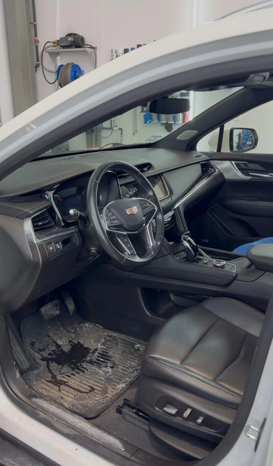 Before - Cadillac XT5 interior driver seat before and after detailing Shrewsbury MA