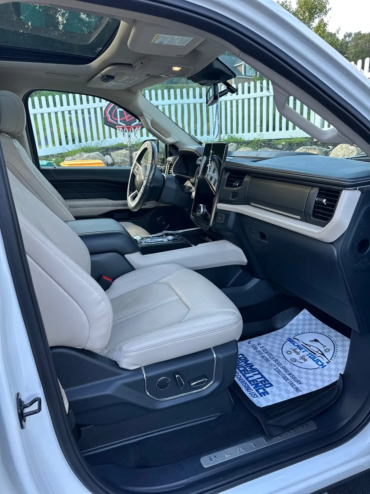 After - Ford Expedition Platinum interior passenger side before and after detailing Shrewsbury MA