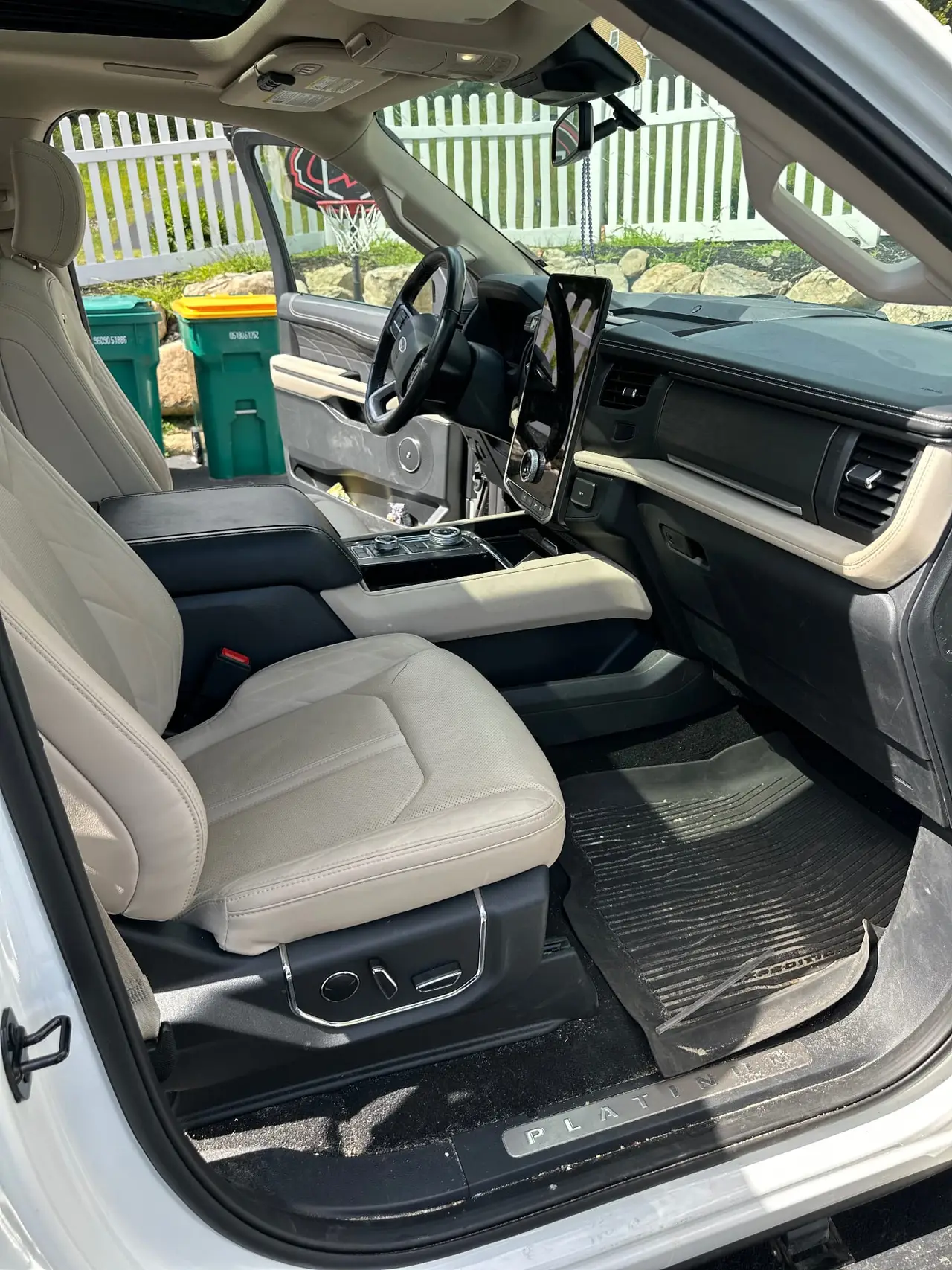 Before - Ford Expedition Platinum interior passenger side before and after detailing Shrewsbury MA