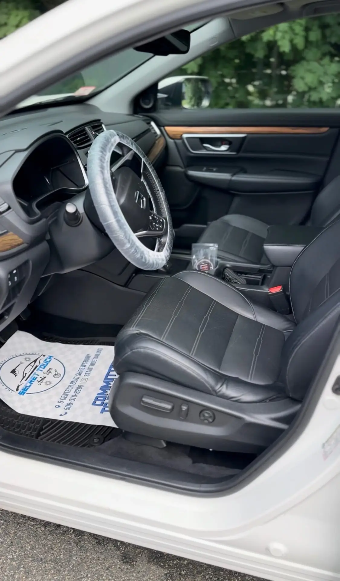 After - Honda CR-V white interior driver seat before and after detailing Shrewsbury MA