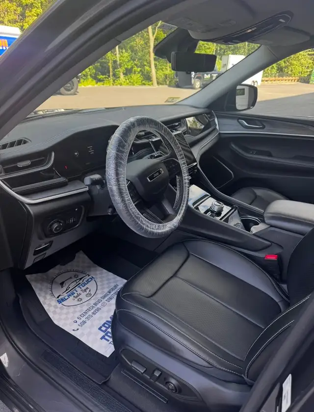 After - Jeep Grand Cherokee interior driver seat before and after detailing Shrewsbury MA