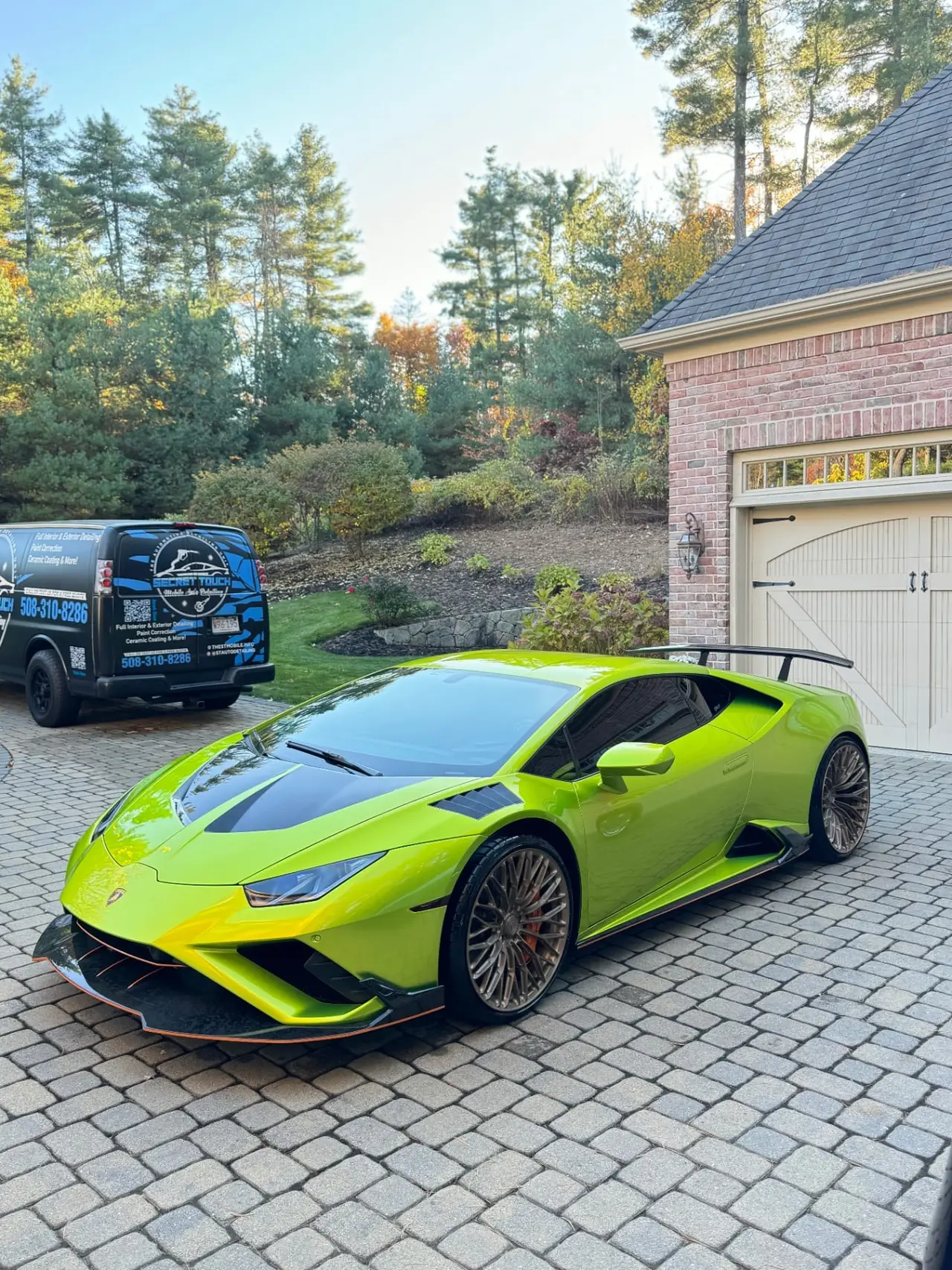 Lime green Lamborghini Huracan mobile detailing with Secret Touch service van
