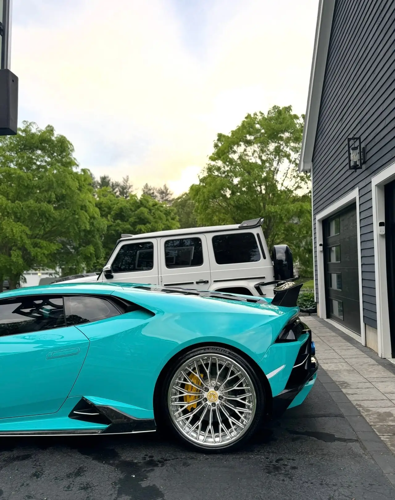 Lamborghini Huracan tiffany blue rear Mercedes G63 white Shrewsbury MA