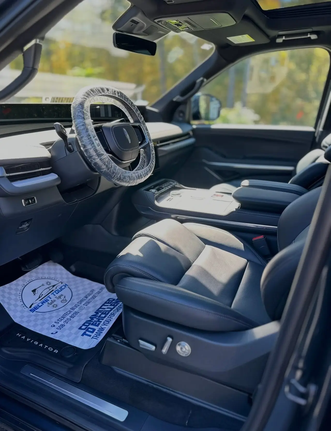 After - Lincoln Navigator interior driver seat before and after detailing Shrewsbury MA