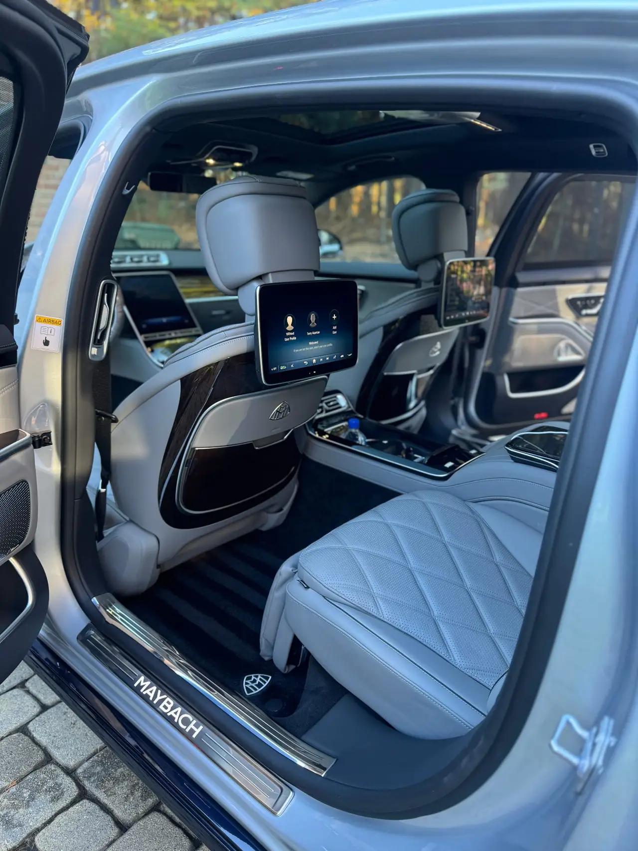 Mercedes Maybach S680 rear seats with entertainment screens interior detailing