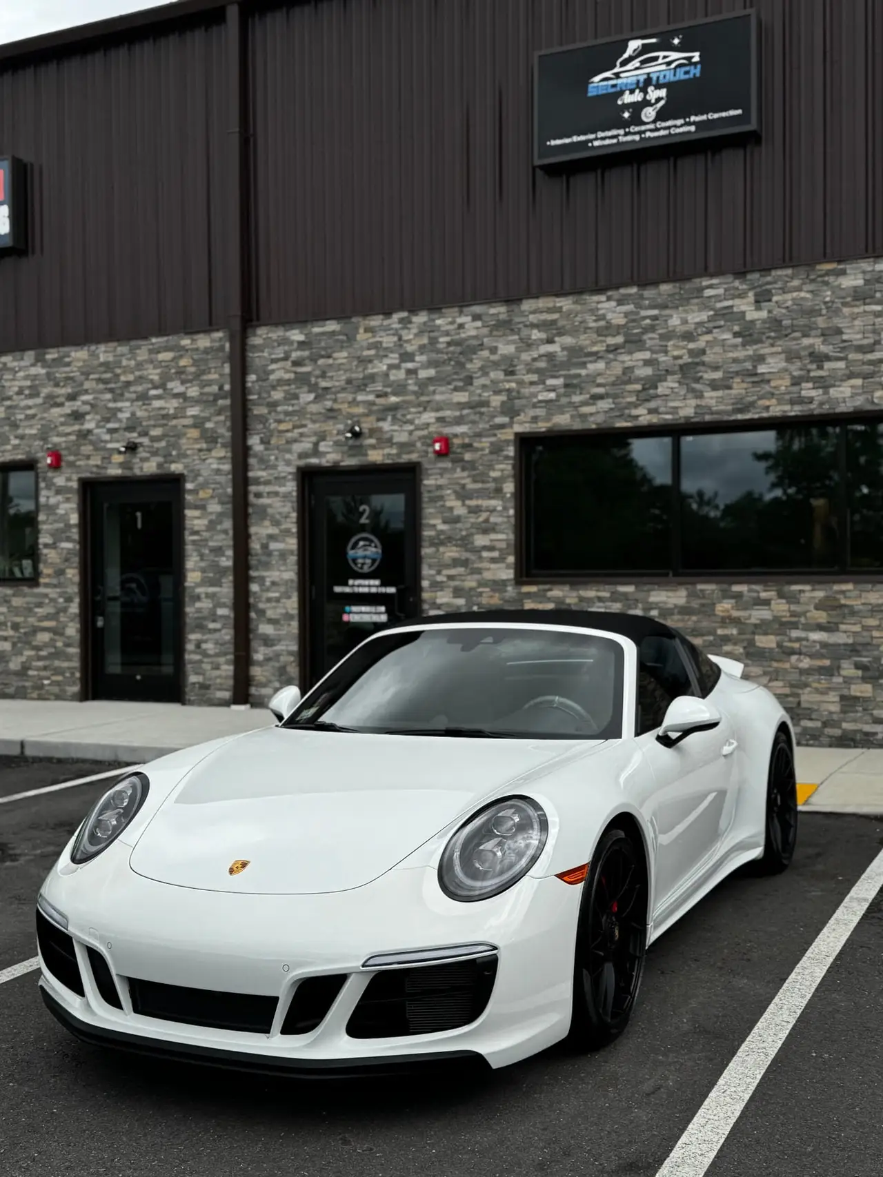 Porsche 911 with professional ceramic coating at Secret Touch Auto Spa Shrewsbury MA