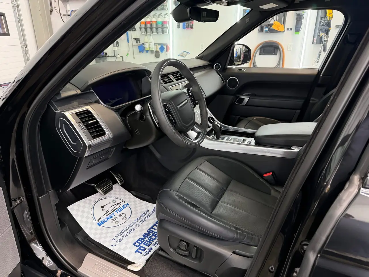 After - Range Rover Sport black interior driver seat before and after detailing Shrewsbury MA