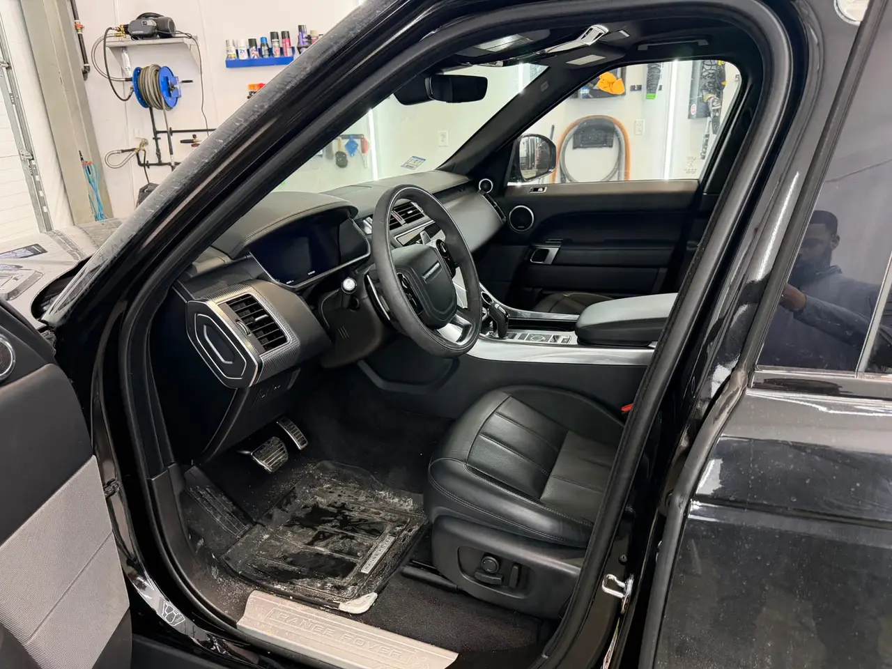Before - Range Rover Sport black interior driver seat before and after detailing Shrewsbury MA
