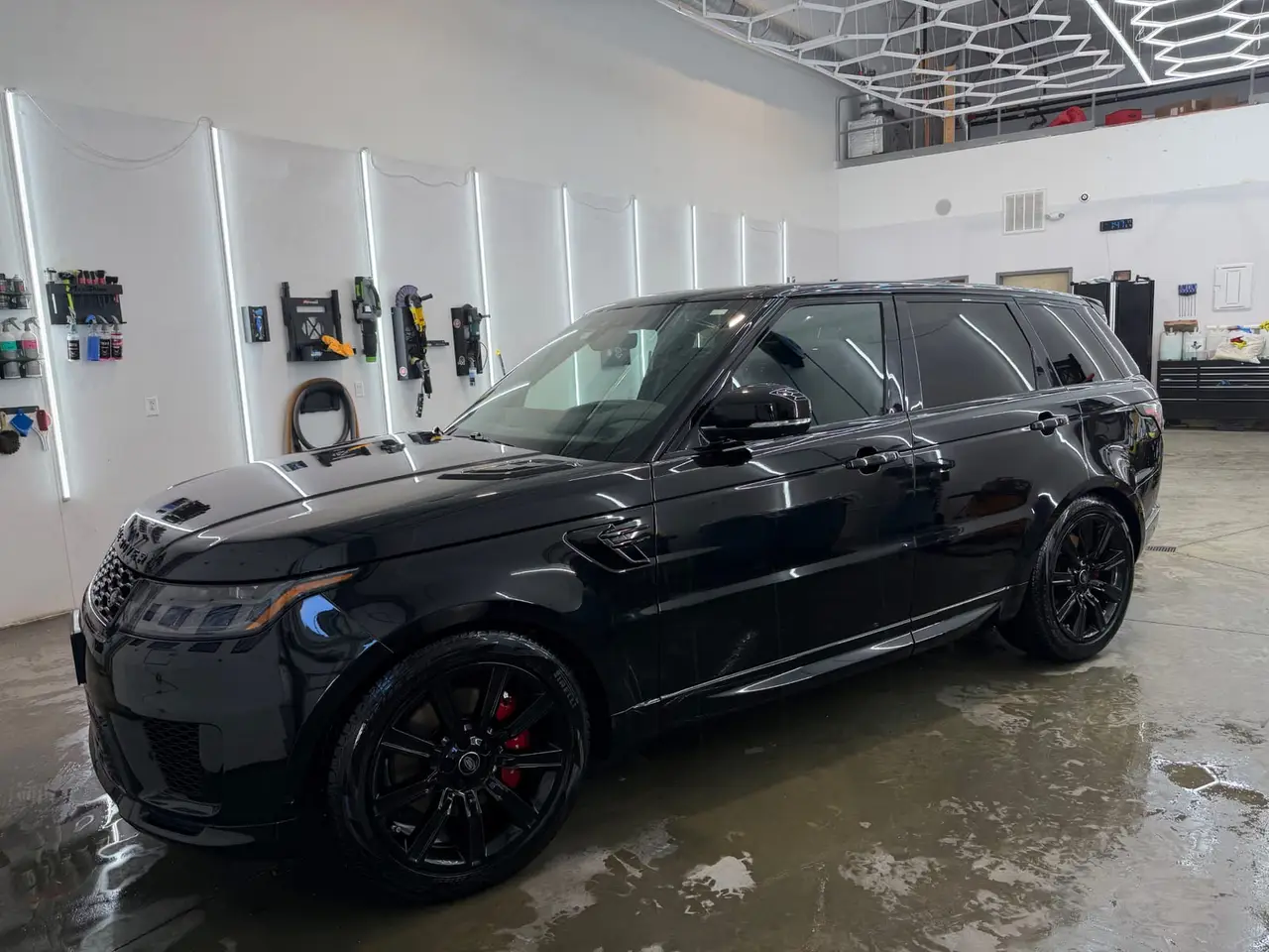After - Range Rover Sport SVR black exterior front before and after detailing Shrewsbury MA