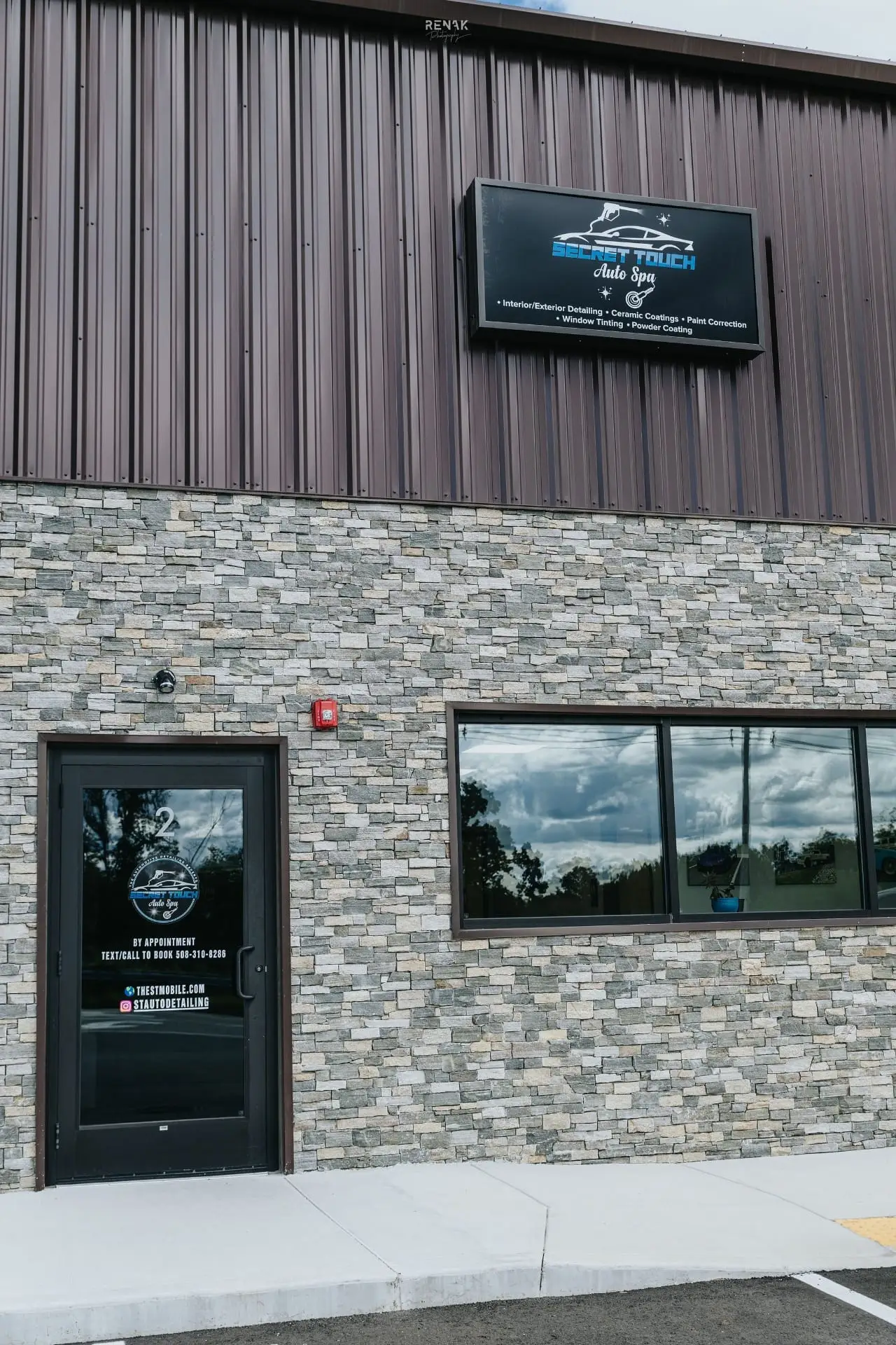 Secret Touch Auto Spa building exterior with signage