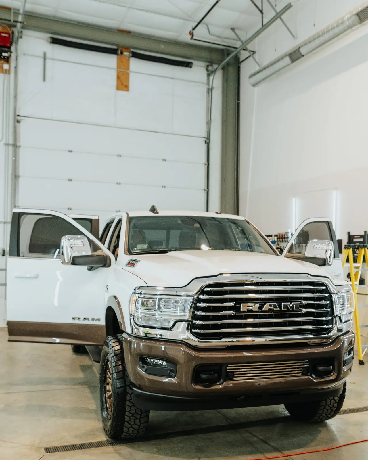 RAM truck in professional detailing bay at Secret Touch Auto Spa