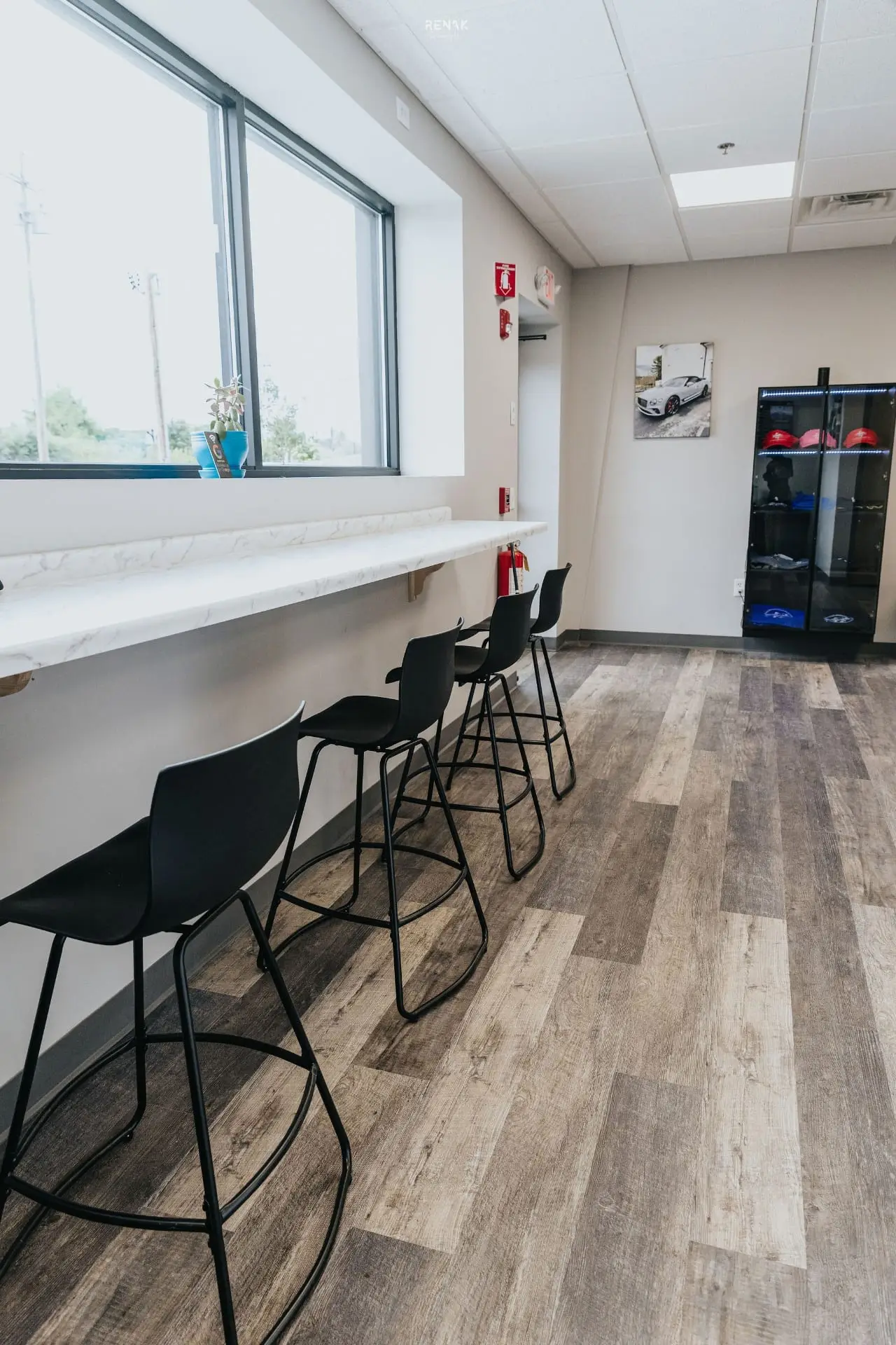 Customer waiting area with seating at Secret Touch Auto Spa