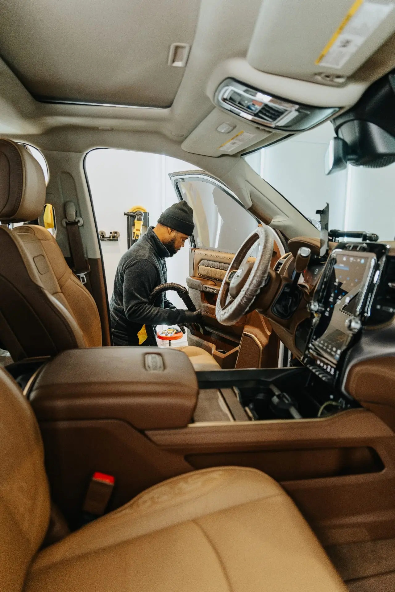 Secret Touch technician performing interior detailing