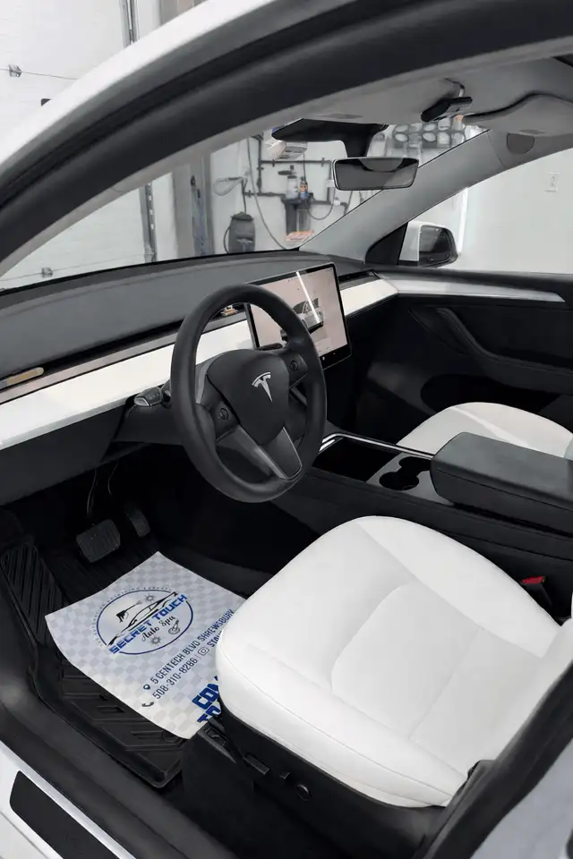 After - Tesla Model 3 white interior driver seat before and after detailing Shrewsbury MA
