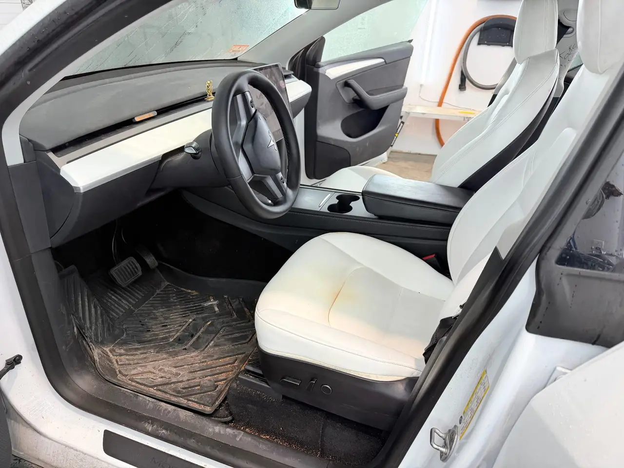 Before - Tesla Model 3 white interior driver seat before and after detailing Shrewsbury MA