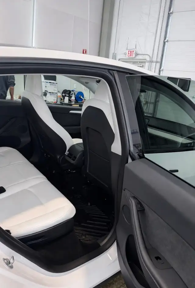 After - Tesla Model Y white interior rear seat before and after detailing Shrewsbury MA