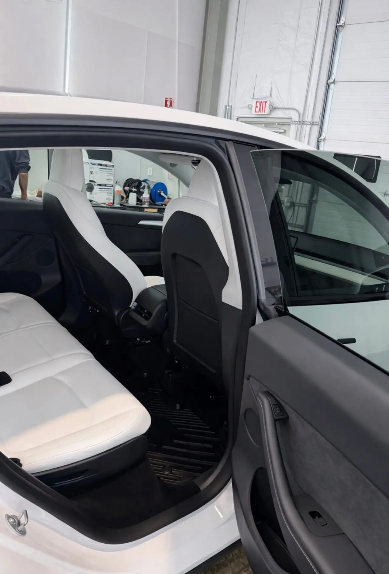 After - Tesla Model Y white interior rear seat before and after detailing Shrewsbury MA