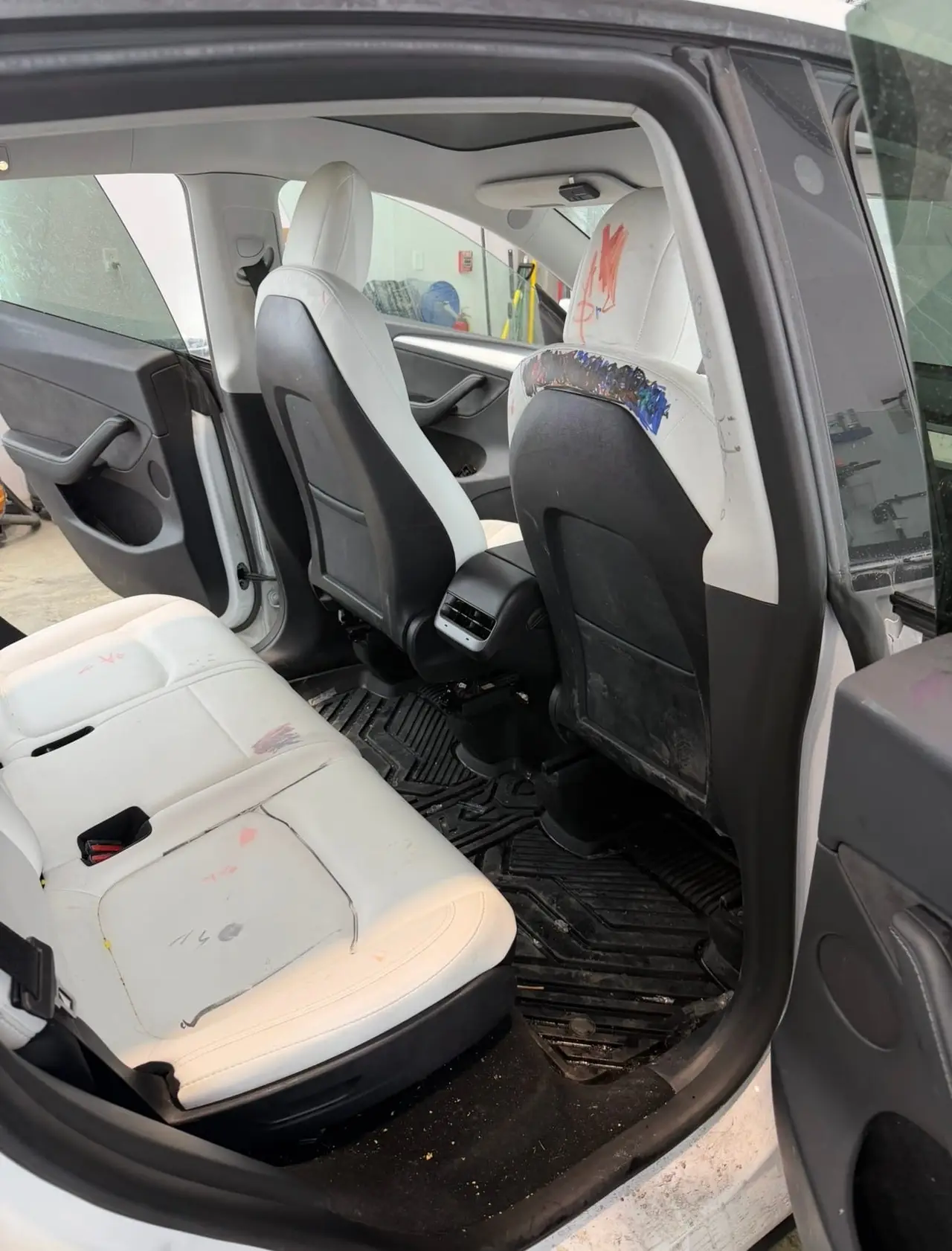 Before - Tesla Model Y white interior rear seat before and after detailing Shrewsbury MA