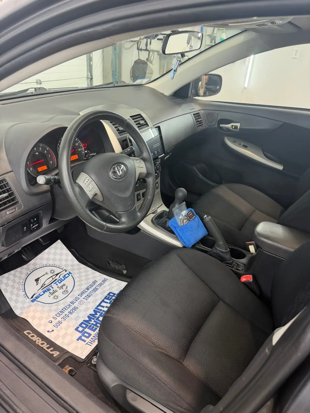 After - Toyota Corolla interior driver seat before and after detailing Shrewsbury MA