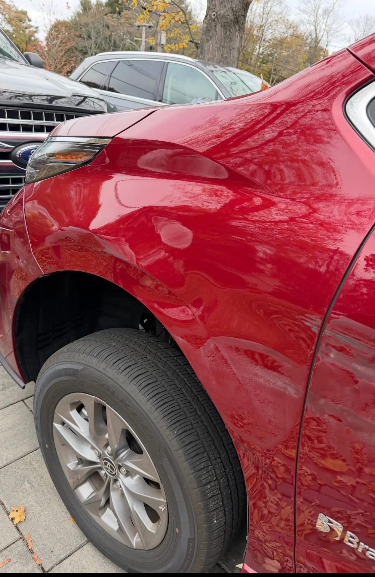 Before - Toyota Sienna red exterior fender before and after detailing Shrewsbury MA